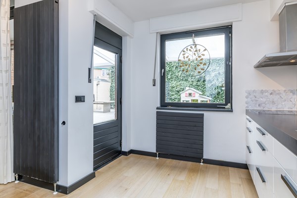 Foto - Te koop: Dr. Calsstraat 48 Landgraaf Instapklare uitstekend onderhouden geschakelde 2 kap woning in Schaesberg